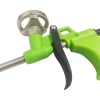 The manufacturer's plastic foam gun has a green handle and an orange handle. It is a thickened polyurethane foam gun with strong air tightness details Picture